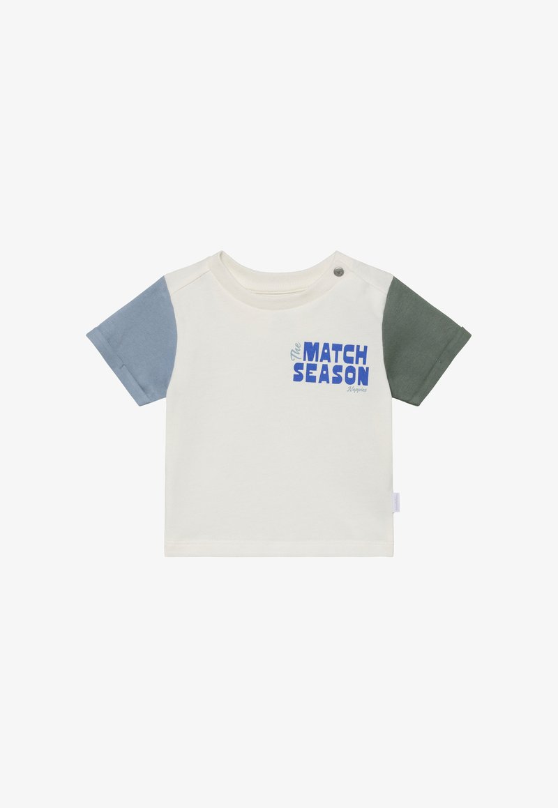 T-shirt in cream with blue and green short sleeves. Features “The Match Season” in bold blue lettering. Soft cotton blend.