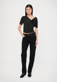 Agolde LOW RISE - Slimfit džínsy - immersion