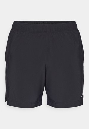 Sorte atletikksjorter med elastisk midjebånd, lett stoff og sidespalter. Har en hvit Jordan-logo nederst til venstre.