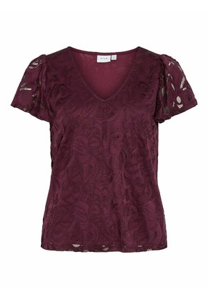 Haut bordeaux avec un décolleté en V et des manches courtes bouffantes. Fabriqué en dentelle texturée avec des détails de motif floral. Non doublé avec une coupe décontractée.