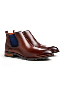 Braune Leder-Chelsea-Stiefel mit glatter Oberfläche, marineblauen elastischen Seitenpaneelen und einem niedrigen, gestapelten Absatz mit geschichteten Holzakzenten.