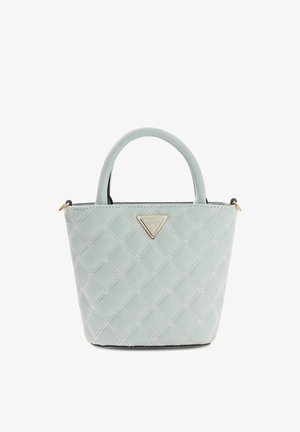 Gesteppte Handtasche in Minzgrün mit zwei oberen Griffen, goldenem dreieckigem Logo-Akzent und kontrastierendem schwarzen Innenfutter. Kompaktes, strukturiertes Design.