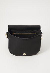 Tommy Hilfiger LOGOTAPE SADDLE BAG - Sac bandoulière - black