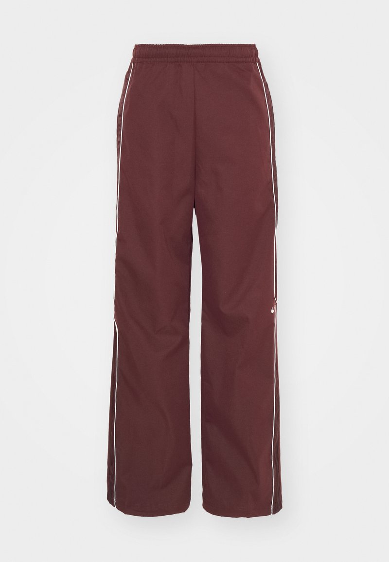 Pantalons de sport bordeaux avec ceinture élastique, rayures blanches sur les côtés et coupe ample. Fabriqués à partir d'un tissu lisse et léger pour un maximum de confort.