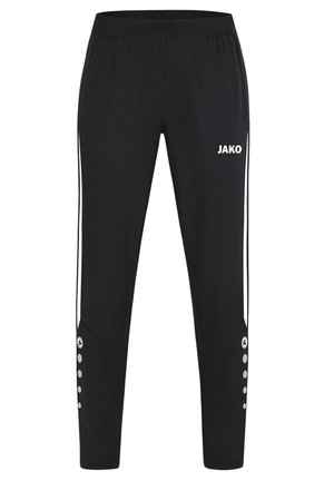 Zwarte sportbroek met witte verticale strepen aan de zijkanten, JAKO-logo aan de voorkant en knoopdetails nabij de onderbenen.