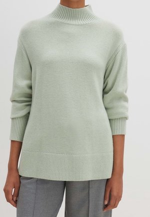 Stickad tröja - light green