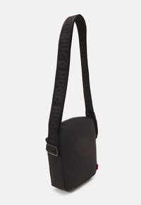 HUGO ETHON LOGO ZIP UNISEX - Axelremsväska - black