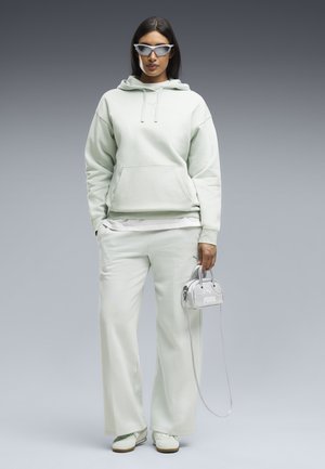 Puma, ESS CENTERED CAT LOGO RELAXED HOODIE FL - Sweat à capuche - créme de mint