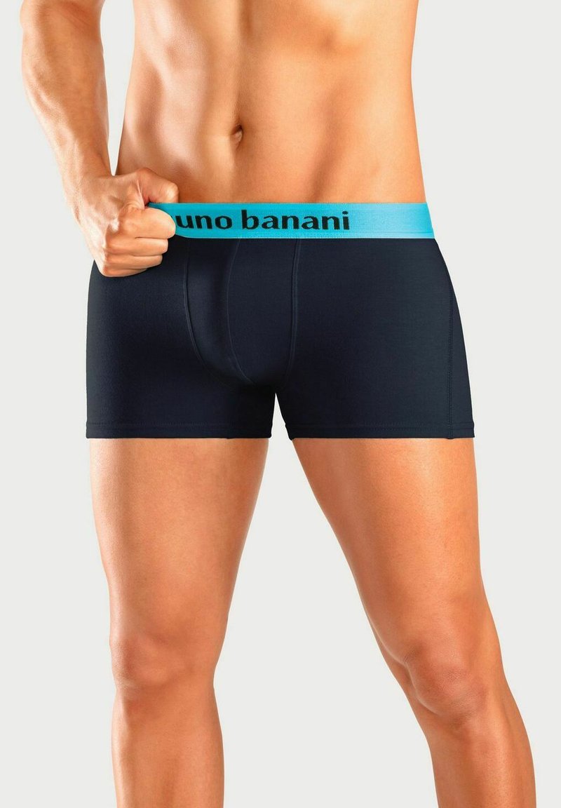 Men's boxer briefs in navy blue fabric with a light blue elastic waistband featuring the brand name "Bruno Banani" in black.