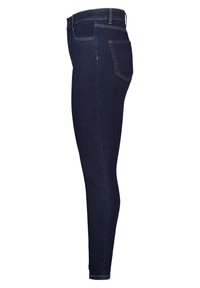 Jean skinny en denim bleu foncé, avec une coupe élégante, une taille standard et un design classique à cinq poches avec des coutures visibles.