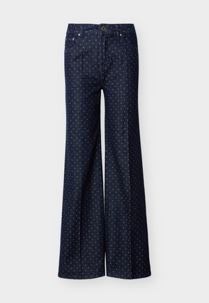 Jean évasé bleu foncé avec petits pois bleu clair, bouton sur le devant et design à cinq poches.