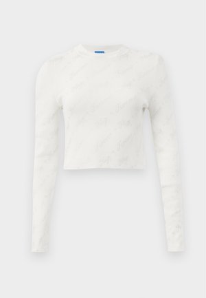 Top bianco a maniche lunghe, cropped, realizzato in tessuto a costine che presenta un motivo testuale ``Forever`` appena accennato su tutta la superficie. Tessuto morbido, scollatura rotonda.