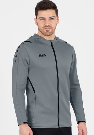 Grau gefütterte Jacke mit Kapuze, aus Netzgewebe, schwarzen Akzenten und einem Logo. Verfügt über Reißverschlusstaschen und kreisförmige Details an den Schultern.