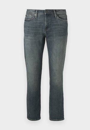 Jean blue à jambes droites avec un léger délavage sur les cuisses et les genoux, fermeture à bouton et zip à l'avant, et design à cinq poches.