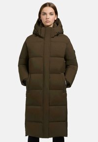 Long, dark green puffer coat with a hood. Features a zip closure, large front pockets, and a quilted design with horizontal panels.