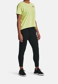 Under Armour Träningsbyxor - black