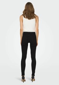 ONLY ONLRAIN MITTLERE TAILLE - Oprijete (skinny) kavbojke - black denim