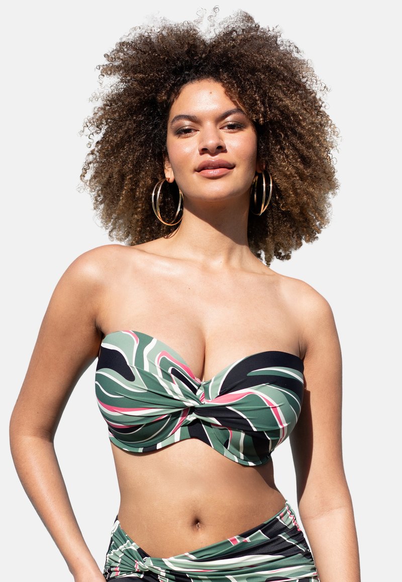 Bikini-Oberteil ohne Träger mit Twist-Design, grüner Stoff mit pinken und schwarzen abstrakten Mustern, glatte Textur, nahtloser Abschluss.