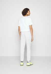 BOSS SESTART - Calças de fato de treino - white