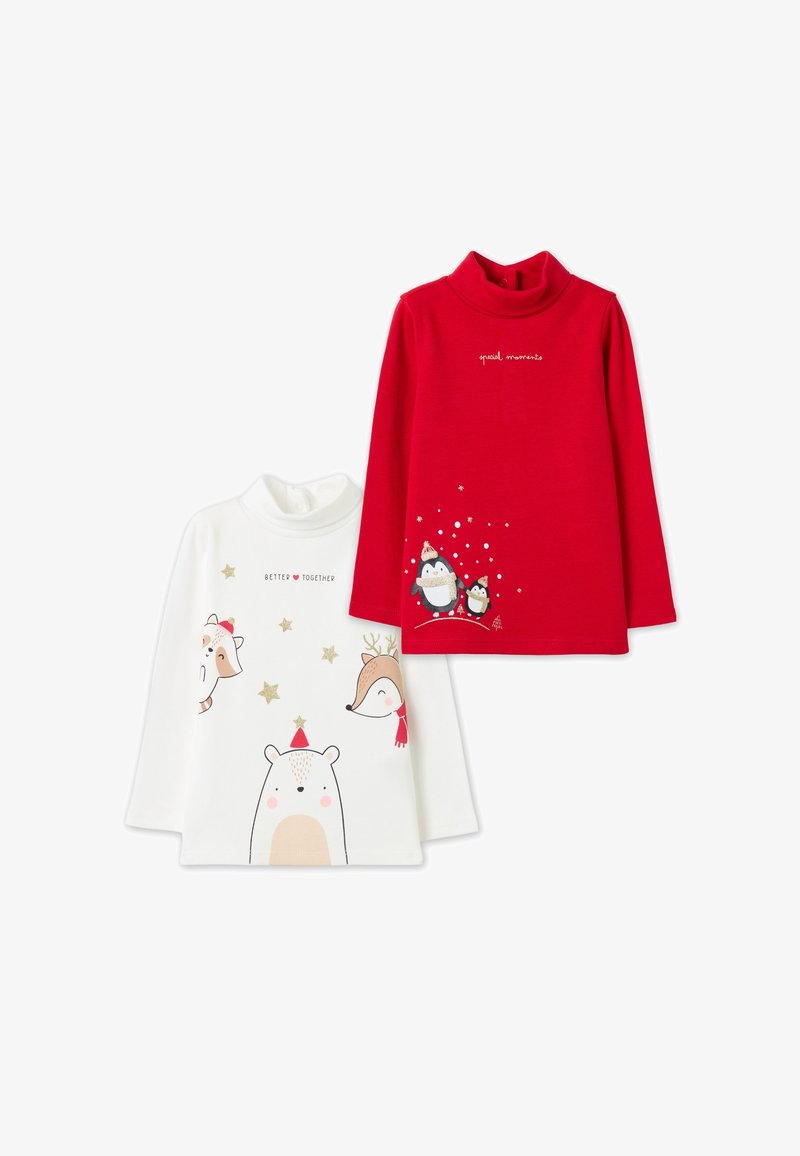 Twee lange mouw turtleneck shirts: één wit met dierenprints en gouden sterren; één rood met pinguïns en de tekst "special moments."