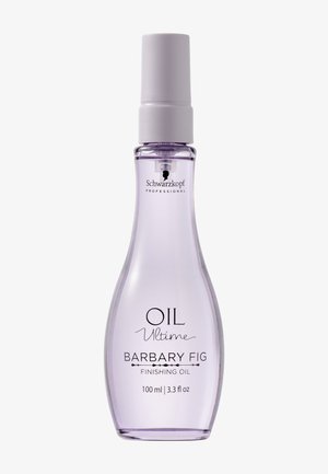 Transparente, längliche Sprühflasche mit einem sanften violetten Farbton, weißem Pumpkopf und schwarzem Text. Enthält 100 ml Barbary-Feigen-Finishöl.