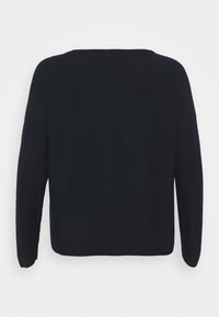 Pull noir uni à manches longues, coupe décontractée et col rond, montré de dos sur fond blanc uni.