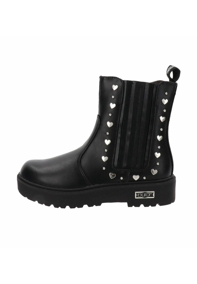 Botín negro con acabado de piel suave, tachuelas plateadas en forma de corazón, inserciones elásticas verticales negras y suela gruesa.