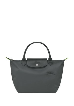 Gray nylon bag with leather handles and flap. Features a snap closure and a subtle logo on one side. Green accent tags on the zipper.