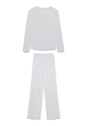 Set di top a maniche lunghe bianche e pantaloni a gamba larga. Presenta un tessuto texturizzato con bordi arricciati neri sulle maniche e sull'orlo. Leggero e dalla vestibilità ampia.