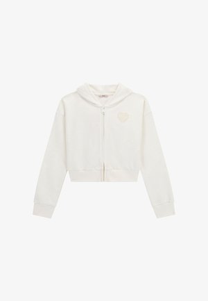 White cropped hoodie in soft fabric, featuring a zip front closure and a small embroidered heart detail on the left chest area.