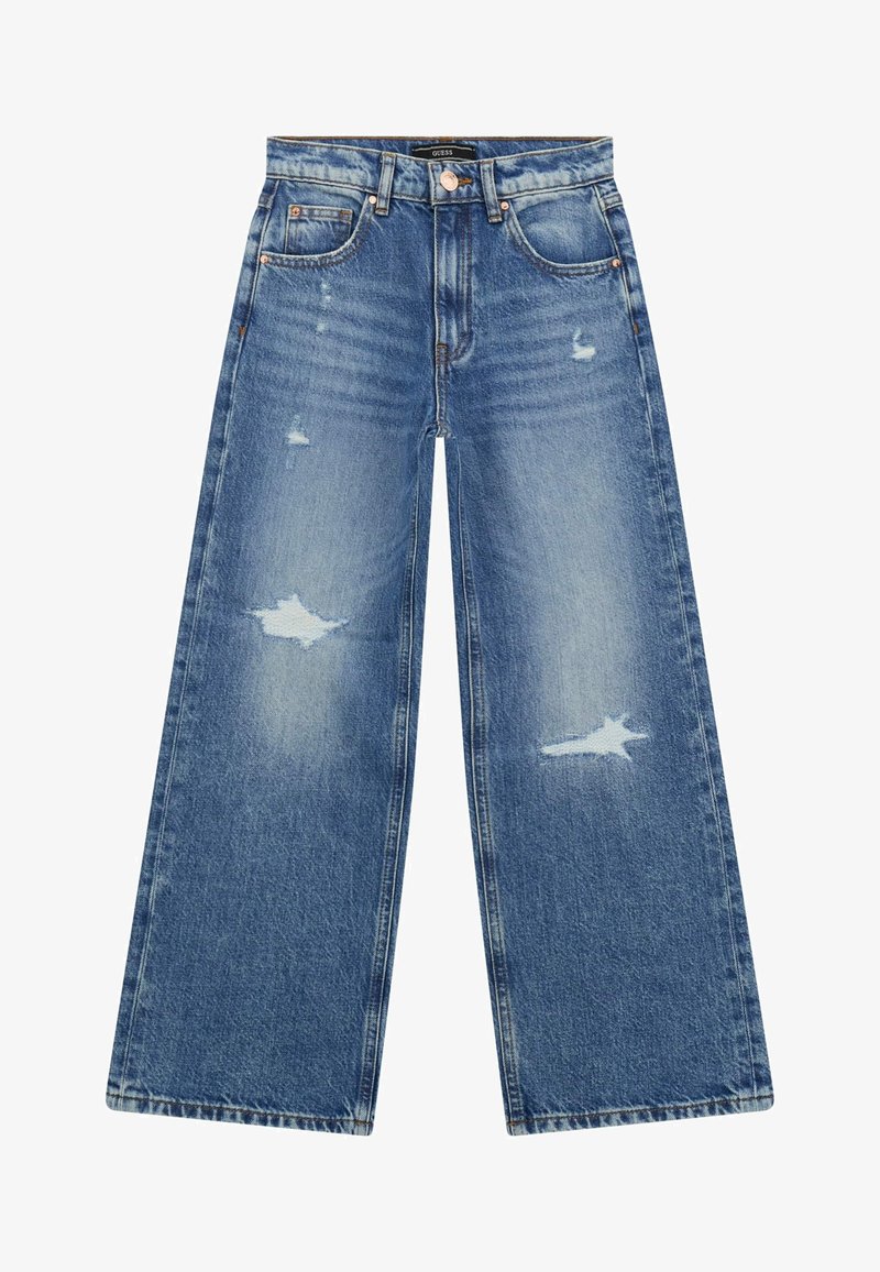 Široké modré džíny z denimu s vybledlým povrchem, obsahující poškozené záplaty, pět kapes, kovové doplňky v měděném odstínu a klasický pas.