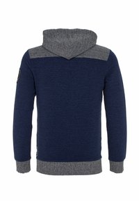 Navy-blaues Hoodie mit strukturiertem Stoff, grauen Schulter- und Kapuzendetails, gerippten Bündchen und Saum, mit einem Logopatch auf dem linken Ärmel.