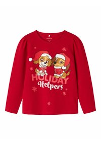 Rotes Langarmshirt mit zwei Cartoon-Hunden in Weihnachtsmannmützen. Der Text lautet "HOLIDAY Helpers" und ist mit Schneeflocken verziert. Weiches Baumwollmaterial.