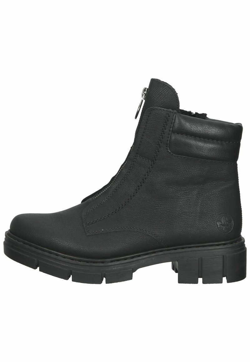 Bottine noire en cuir avec semelle épaisse, fermeture éclair latérale et col rembourré, vue de profil sur fond blanc.