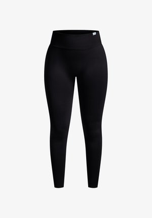 Leggings neri realizzati in un tessuto elastico e morbido. Dotati di una cintura ampia a coste e di un design aderente senza motivi o dettagli visibili.