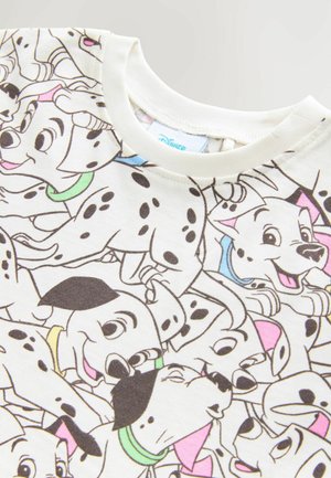Hvid bomulds t-shirt med et gentaget mønster af tegneserie Dalmatians i sort, med farverige detaljer som grønne, blå og pink halsbånd.