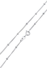 Collier chaîne en argent avec de petites perles espacées de manière régulière et un fermoir à ressort marqué "925" sur un fond blanc.