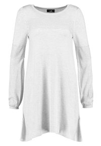 Tunic grigia chiara a maniche lunghe con scollo rotondo, dettaglio in pizzo sulle maniche e spacchi laterali per il movimento. Realizzata in tessuto morbido.