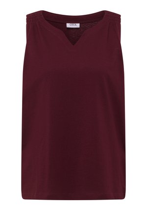 Top sans manches pour femme en bordeaux foncé avec un col en V et des panneaux froncés élastiques aux épaules, étiqueté « CECIL ».