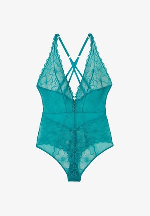 Body verde acqua in pizzo con motivi floreali, scollatura profonda, spalline incrociate e un fermo decorativo frontale. Tessuto semi-trasparente.