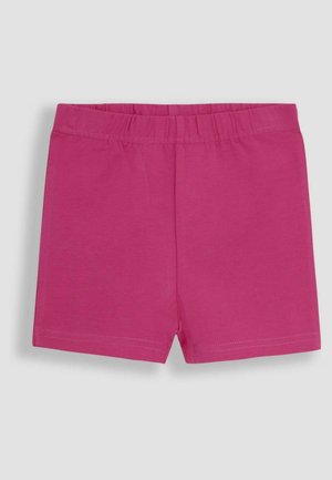 Rožiniai medvilniniai šortai su elastinga juosta, pasižymintys paprastu dizainu ir lygiu paviršiumi. Apatiniai kraštai užbaigti, kišenių nėra.