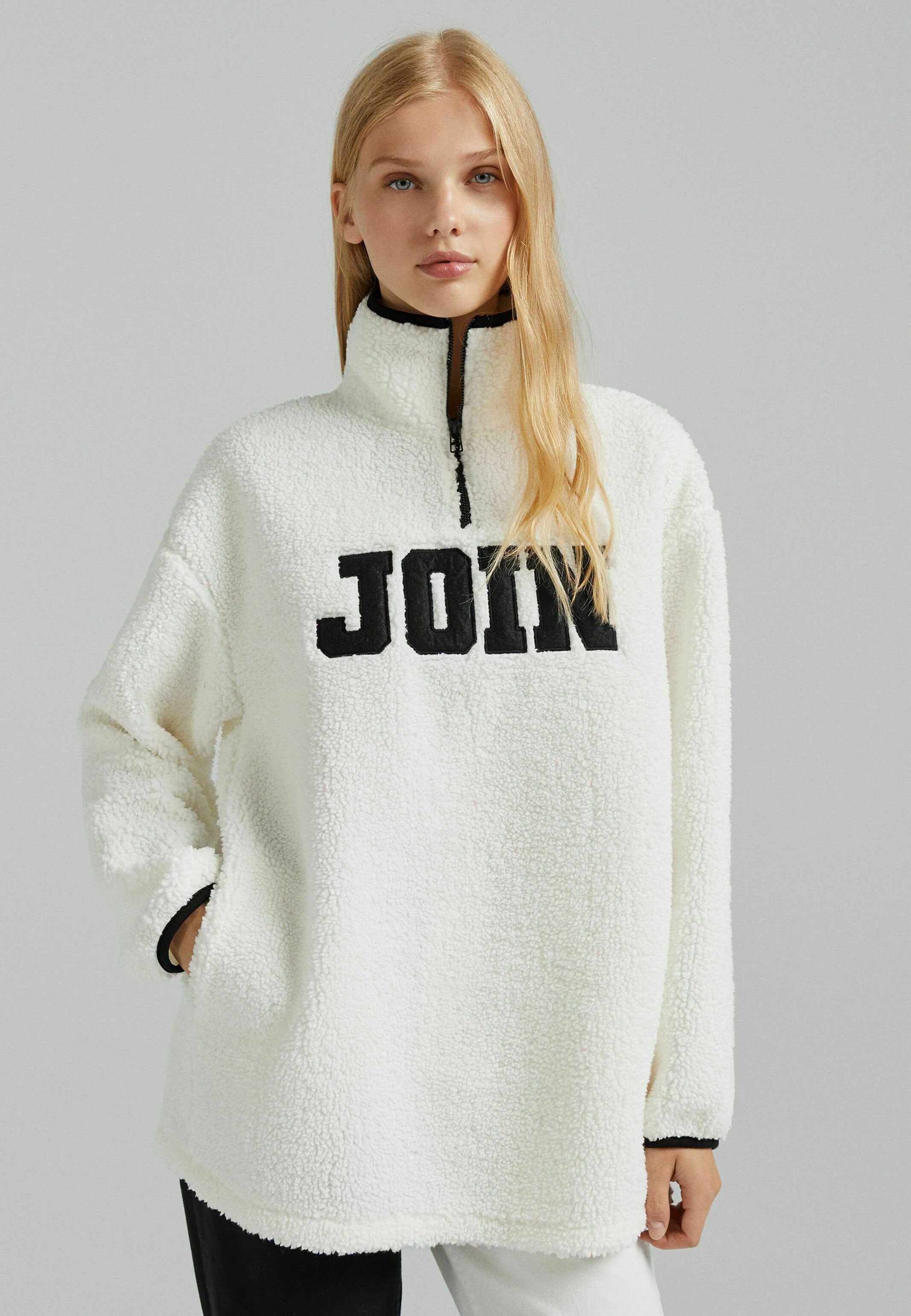 white fleece jumper
