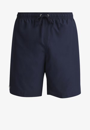 Calções de banho azul-marinho feitos de um tecido leve, com um cós elástico e cordão ajustável, e um pequeno detalhe de logótipo de lado.