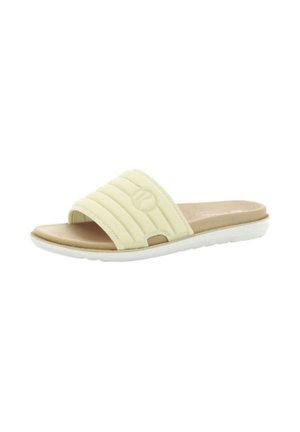 Sandalo tipo slide beige con cinturino imbottito trapuntato e suola bianca, progettato per un uso casual e un facile comfort da infilare.