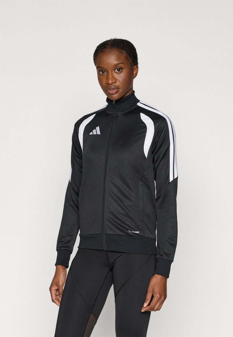 Μαύρο αθλητικό σακάκι με ψηλό γιακά, λευκές ριγέ λεπτομέρειες, κλείσιμο με φερμουάρ και λογότυπο "climacool" στη μέση. Λείο, ελαφρύ ύφασμα.