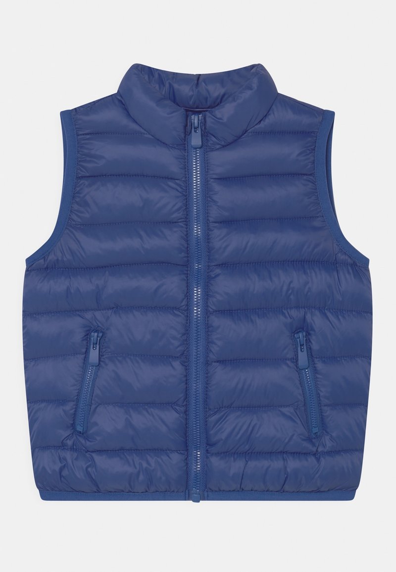 Gilet imbottito blue navy con colletto alto, zip frontale a tutta lunghezza e due tasche frontali con zip. Design leggero e trapuntato con una texture liscia.