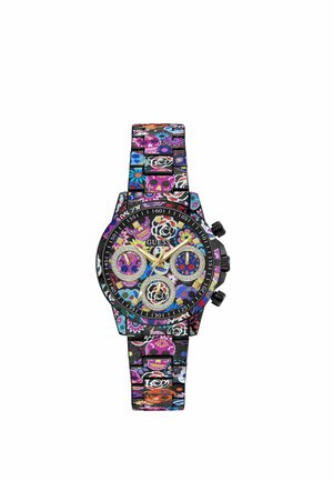 Kleurrijk Guess-horloge met bloemen- en schedelpatronen op band en wijzerplaat, met goudkleurige wijzers en drie kleine subdials op zwarte lunet.