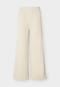 Κρεμ παντελόνι με φαρδιά μπατζάκια, ψηλή μέση και χωρίς ορατά κουμπώματα ή τσέπες, εμφανιζόμενο πάνω σε λευκό φόντο.