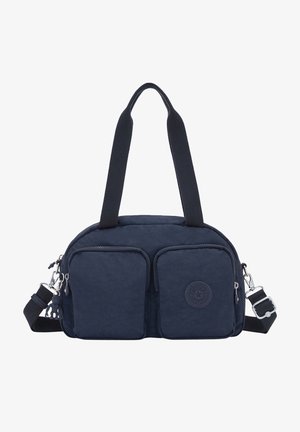 Mørkeblå taske med to frontlukkede lommer, justerbar strop og holdbart stof. Funker en rund logo på den ene side og en glat tekstur.