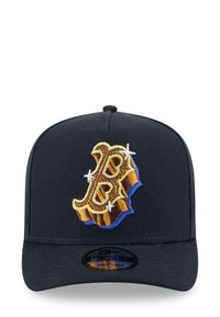 Black snapback cap with a three-dimensional gold and blue embroidered logo, featuring star-like accents and a flat brim.